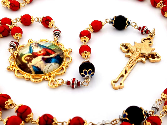 Our Lady of Sorrows unique rosary beads howlite and onyx gemstone rosary with gold plated Saint Benedict crucifix.
