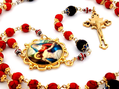 Our Lady of Sorrows unique rosary beads howlite and onyx gemstone rosary with gold plated Saint Benedict crucifix.