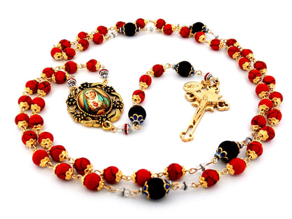 Our Lady of Sorrows unique rosary beads howlite and onyx gemstone rosary beads with gold plated Saint Benedict crucifix.