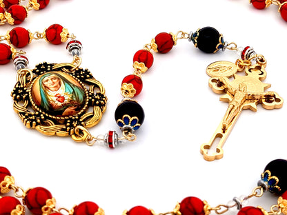 Our Lady of Sorrows unique rosary beads howlite and onyx gemstone rosary beads with gold plated Saint Benedict crucifix.