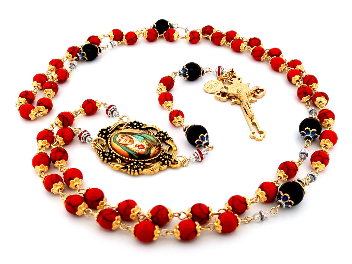 Our Lady of Sorrows unique rosary beads howlite and onyx gemstone rosary beads with gold plated Saint Benedict crucifix.