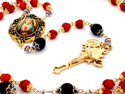 Our Lady of Sorrows unique rosary beads howlite and onyx gemstone rosary beads with gold plated Saint Benedict crucifix.