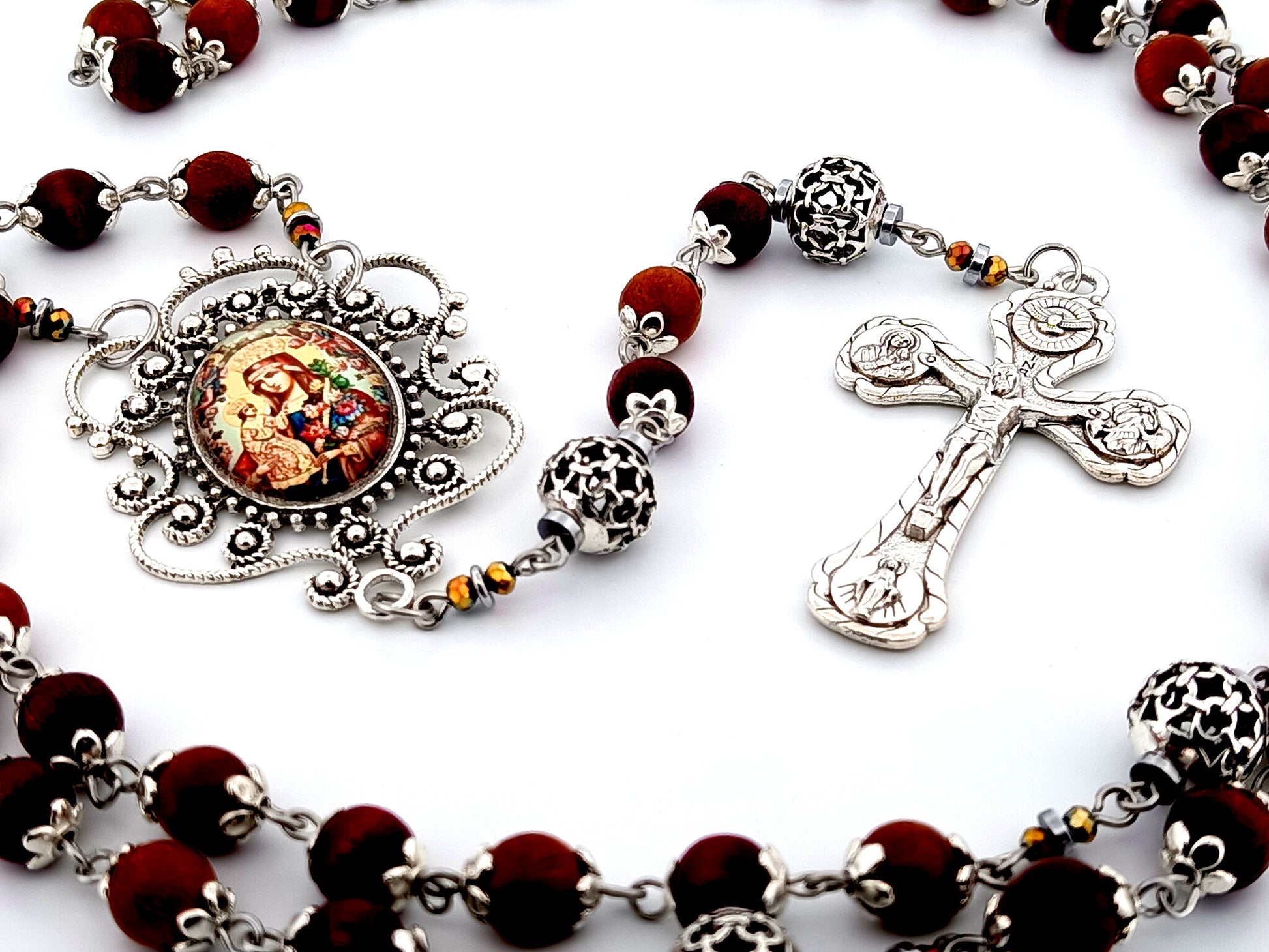 Our Lady of Perpetual Help unique rosary beads dark olive wood and silver rosary with Four Basilicas crucifix.