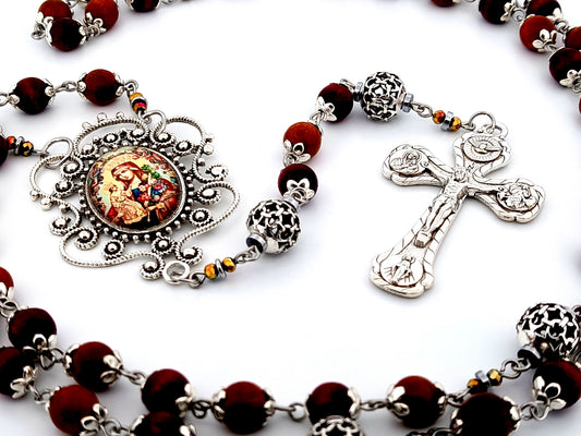 Our Lady of Perpetual Help unique rosary beads dark olive wood and silver rosary with Four Basilicas crucifix.