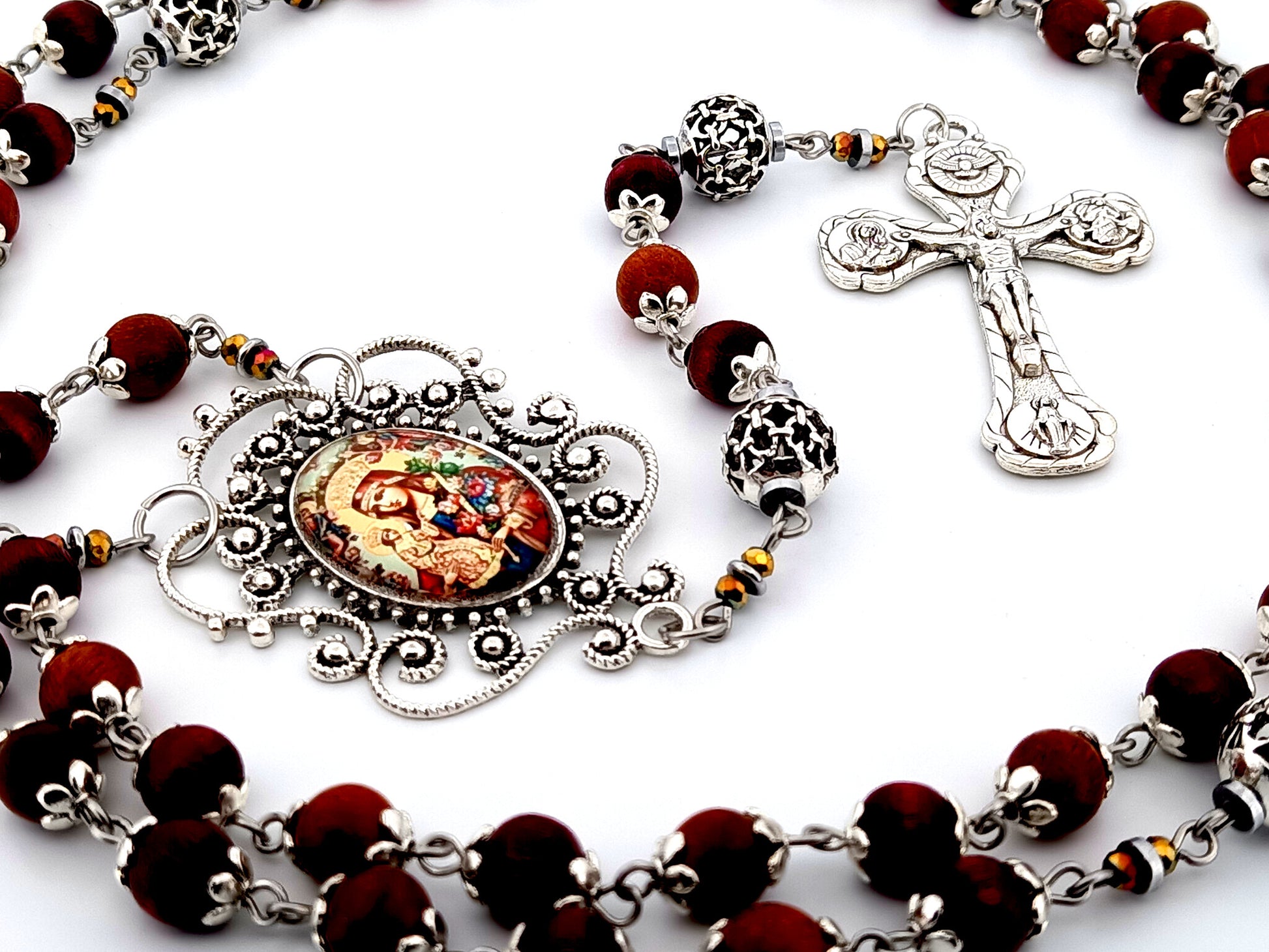 Our Lady of Perpetual Help unique rosary beads dark olive wood and silver rosary with Four Basilicas crucifix.