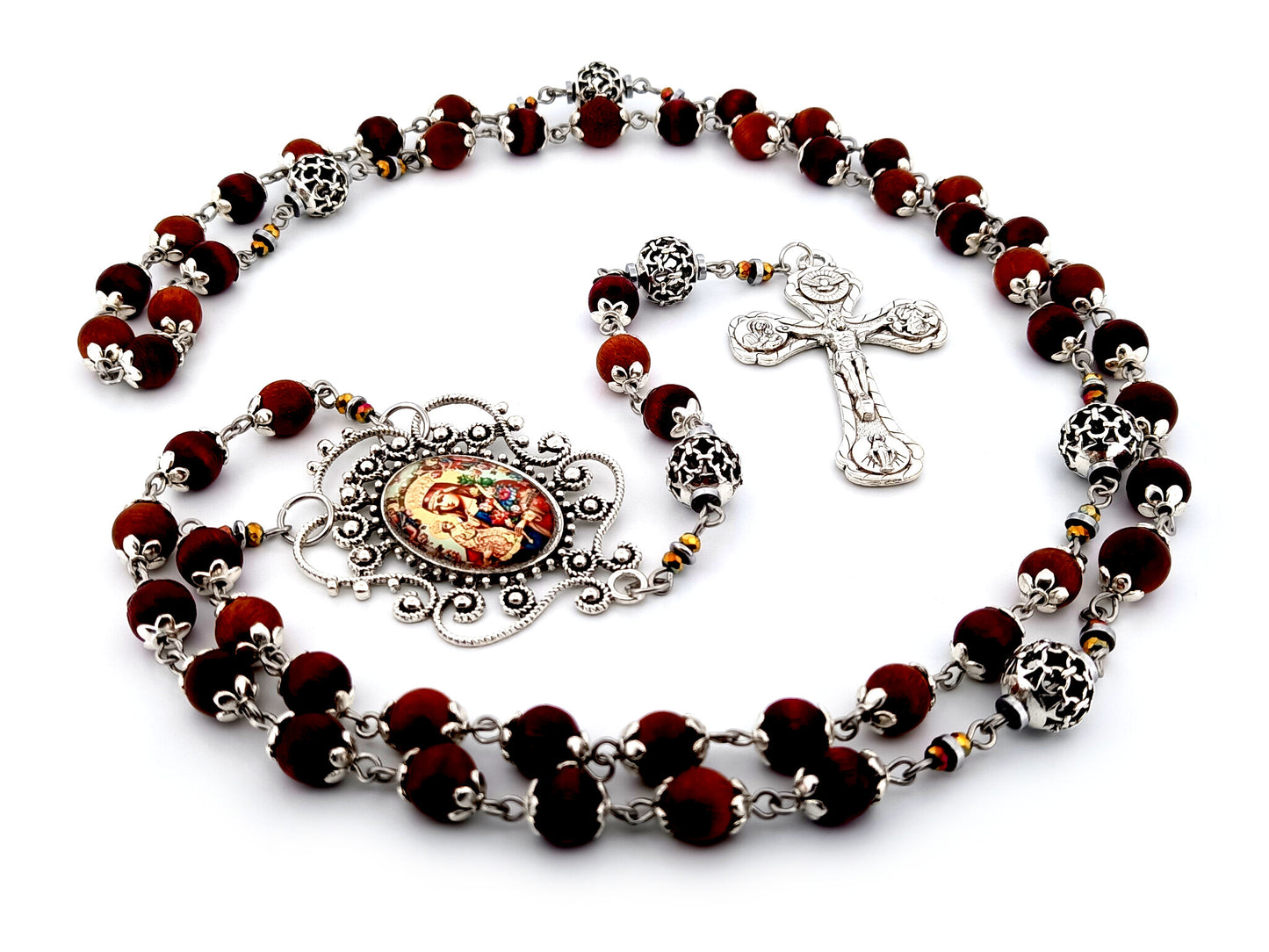 Our Lady of Perpetual Help unique rosary beads dark olive wood and silver rosary with Four Basilicas crucifix.