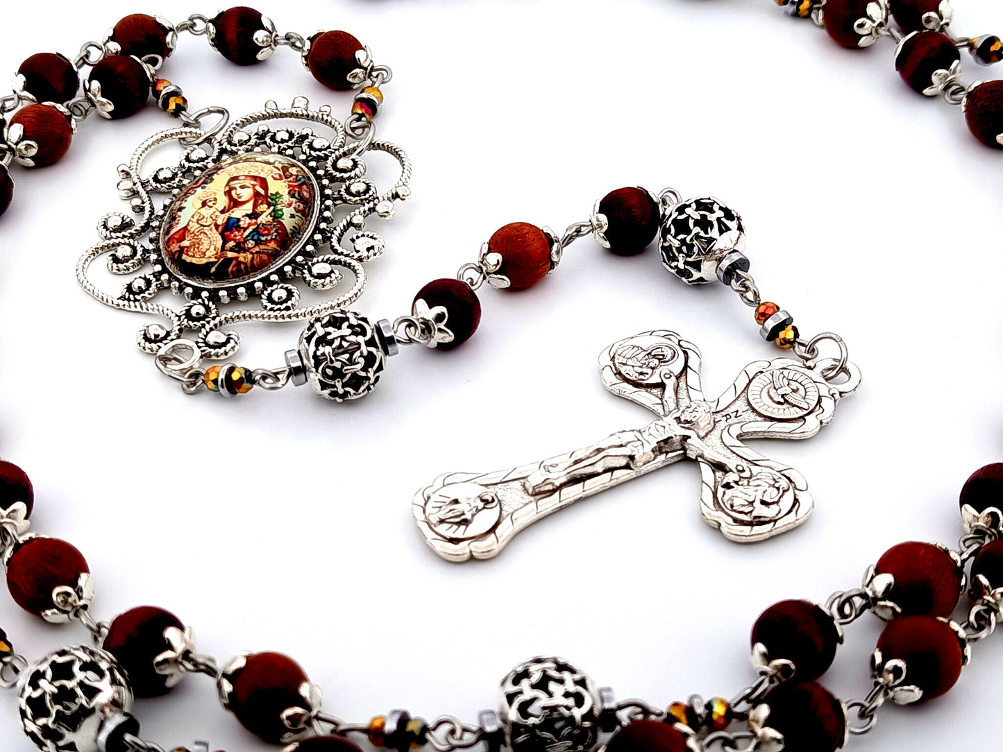 Our Lady of Perpetual Help unique rosary beads dark olive wood and silver rosary with Four Basilicas crucifix.