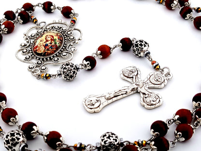 Our Lady of Perpetual Help unique rosary beads dark olive wood and silver rosary with Four Basilicas crucifix.