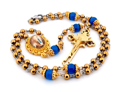 Our Lady of Lourdes unique rosary beads gold plated stainless steel and blue cats eye glass rosary with gold plated Saint Benedict crucifix.