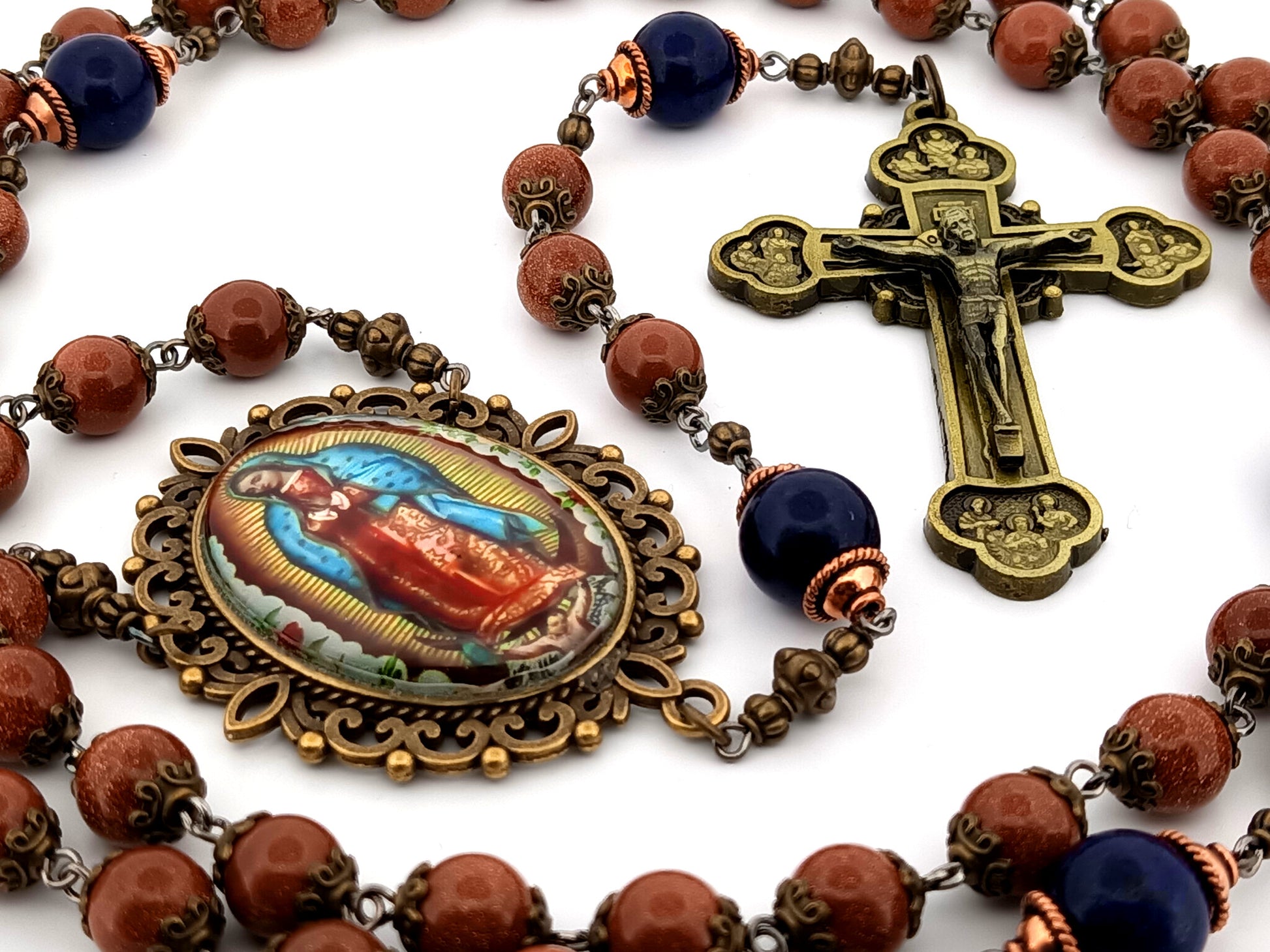 Our Lady of Guadalupe unique rosary beads gold stone and lapis lazuli gemstone rosary with brass twelve apostles crucifix.