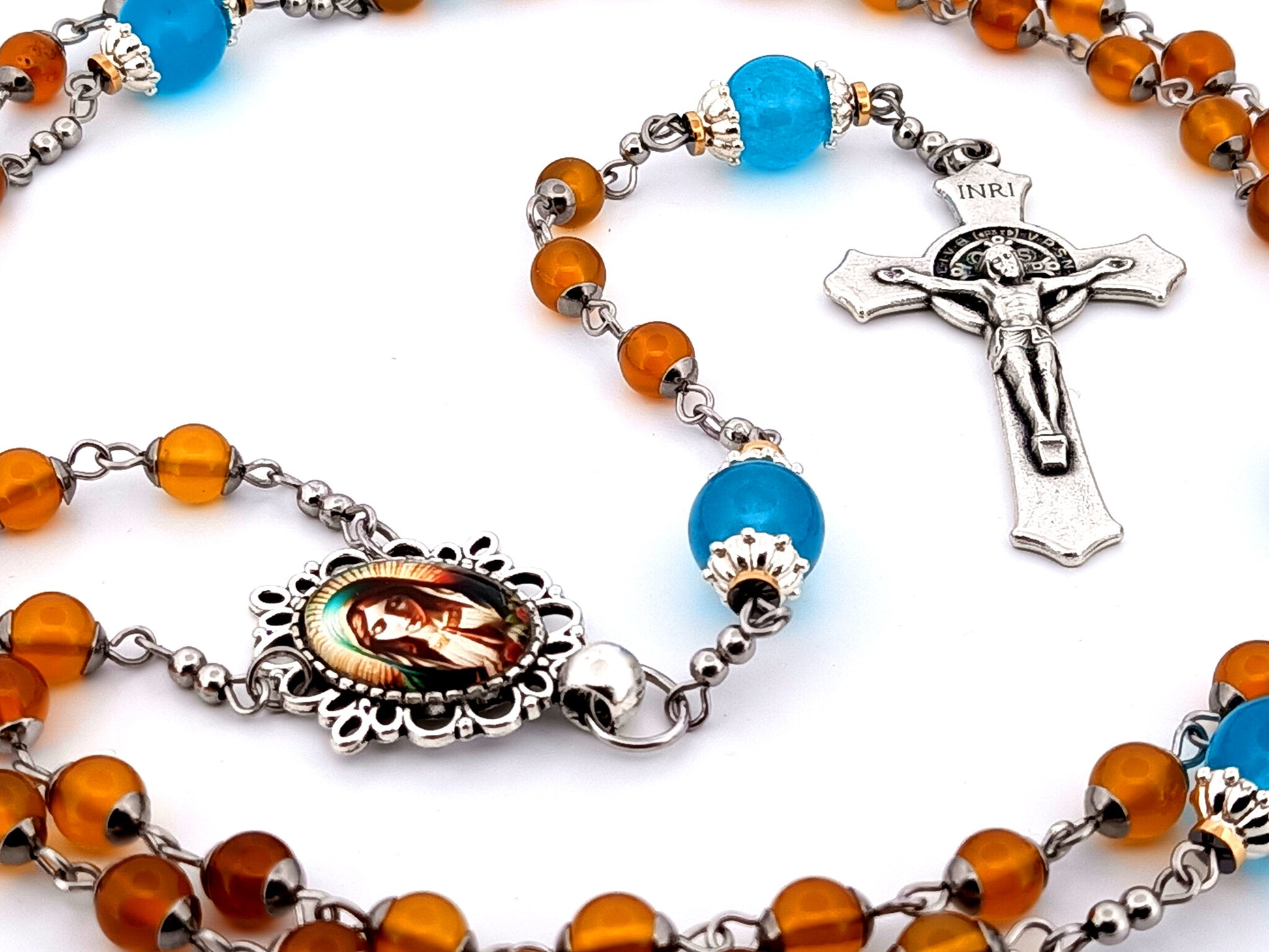 Virgin Mary praying unique rosary beads orange and blue glass rosary with Saint Benedict crucifix.