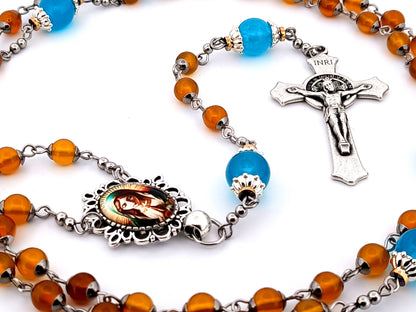 Virgin Mary praying unique rosary beads orange and blue glass rosary with Saint Benedict crucifix.