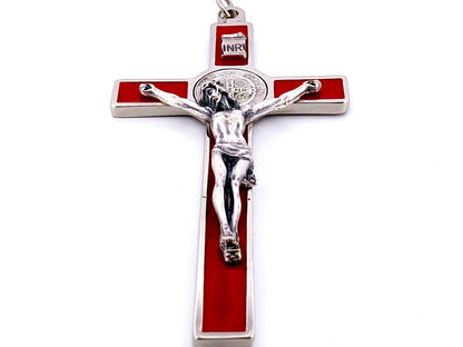 Silver and red enamel Saint Benedict crucifix.