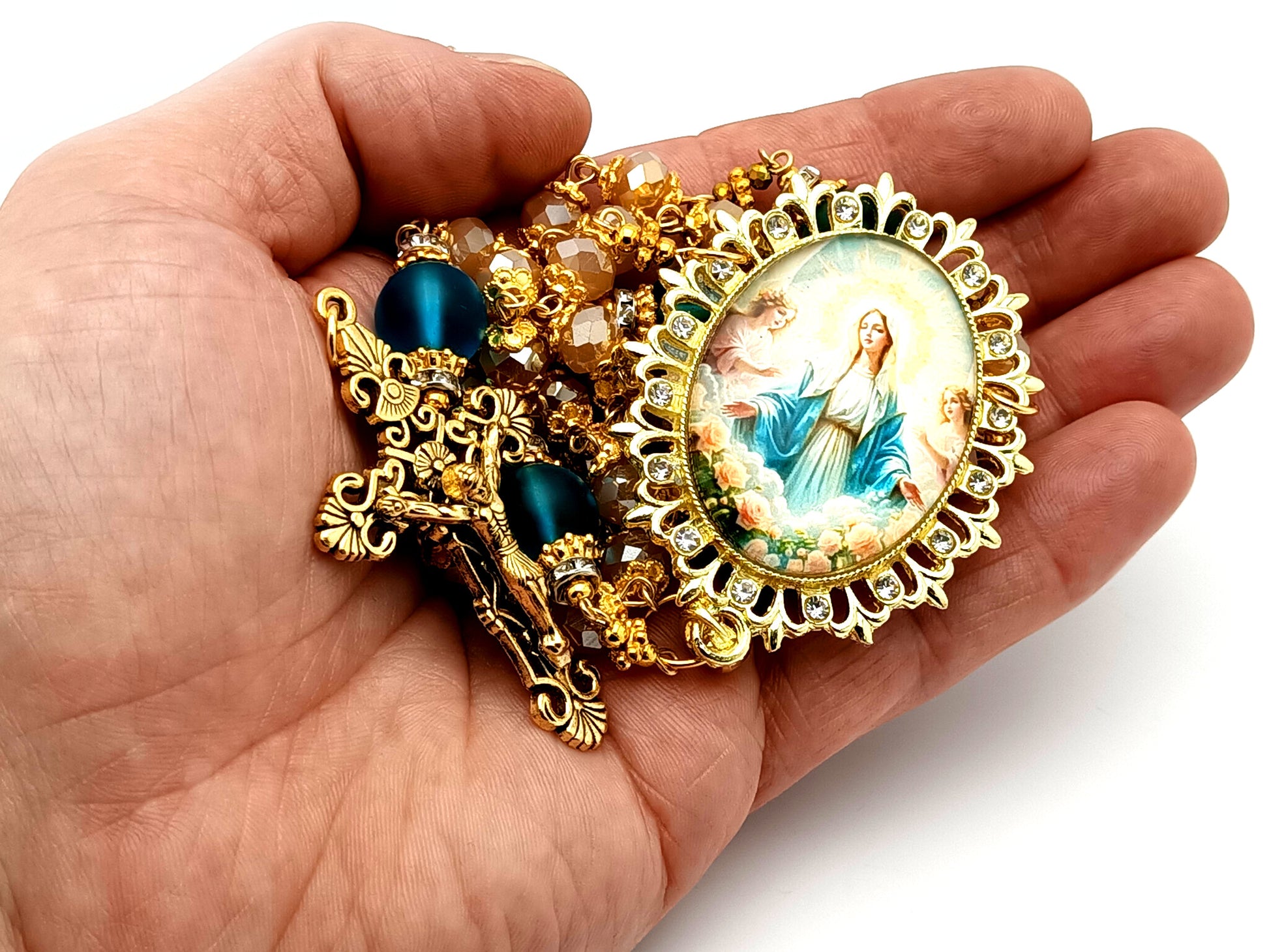 Assumption of Our Lady unique rosary beads rose gold faceted and blue glass beads with gold plated filigree crucifix.