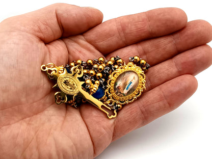 Our Lady of Lourdes unique rosary beads gold plated stainless steel and blue cats eye glass rosary with gold plated Saint Benedict crucifix.