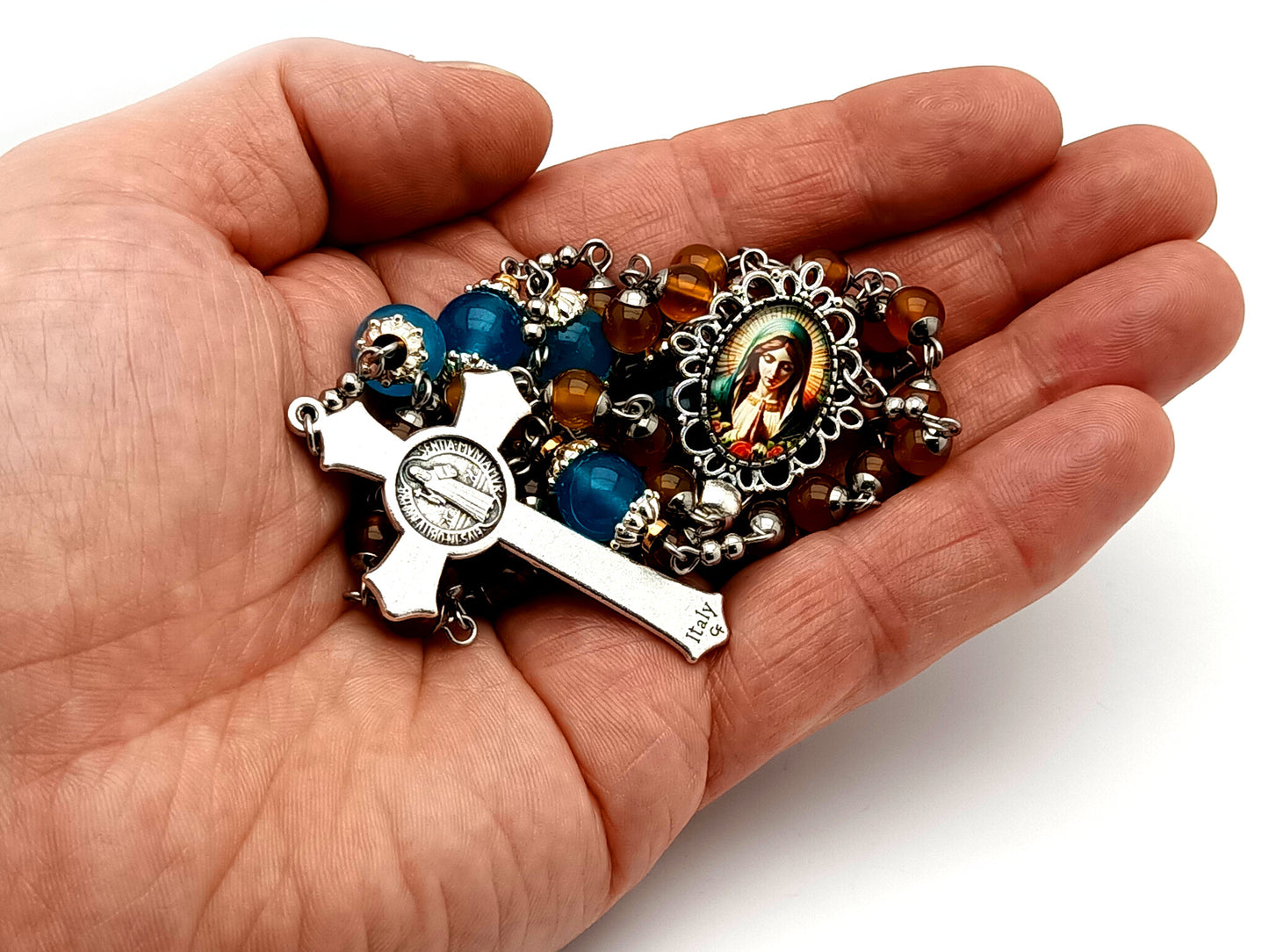 Virgin Mary praying unique rosary beads orange and blue glass rosary with Saint Benedict crucifix.
