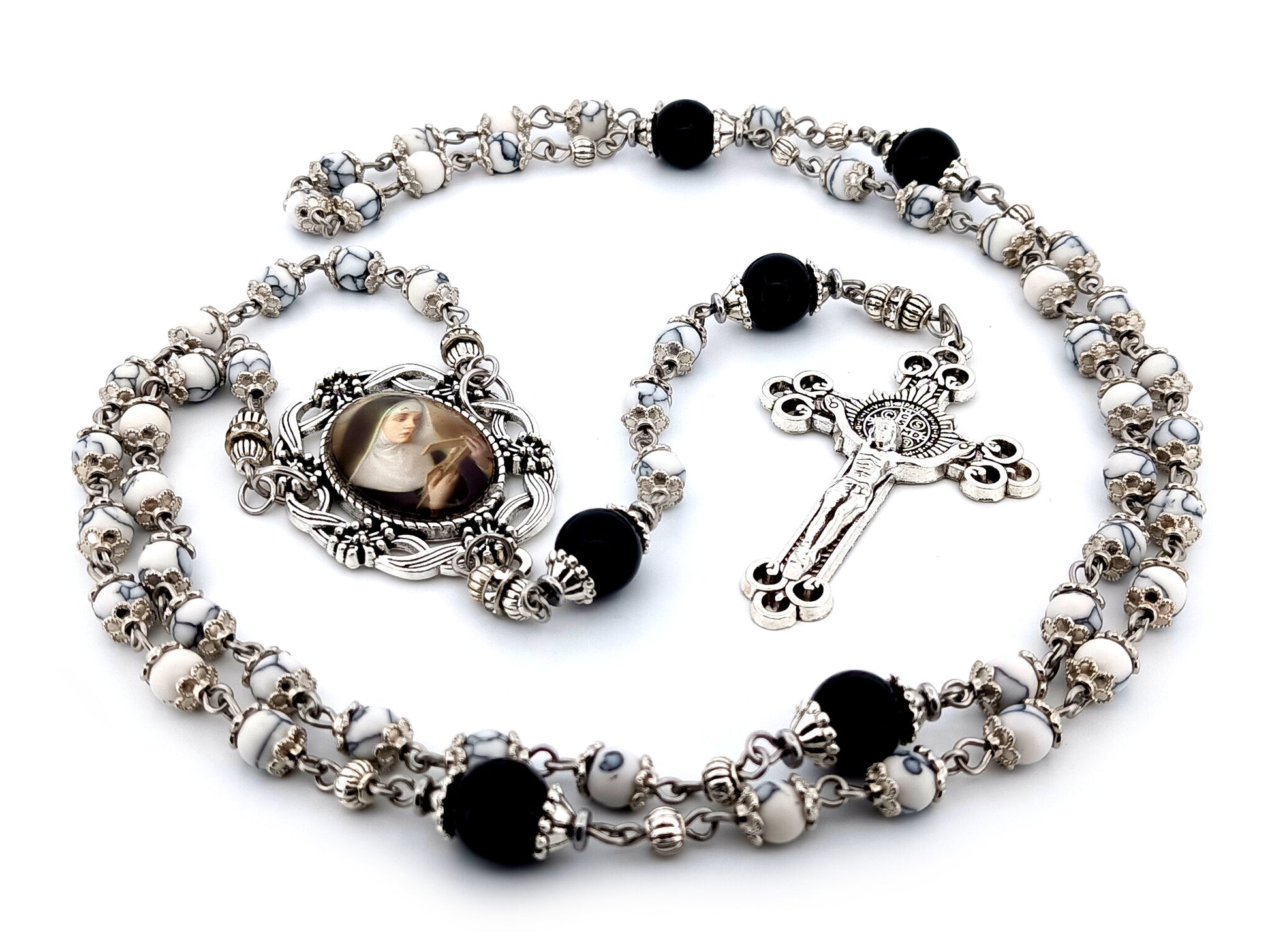 Saint Rita unique rosary beads howlite and onyx gemstone rosary with Saint Benedict crucifix.