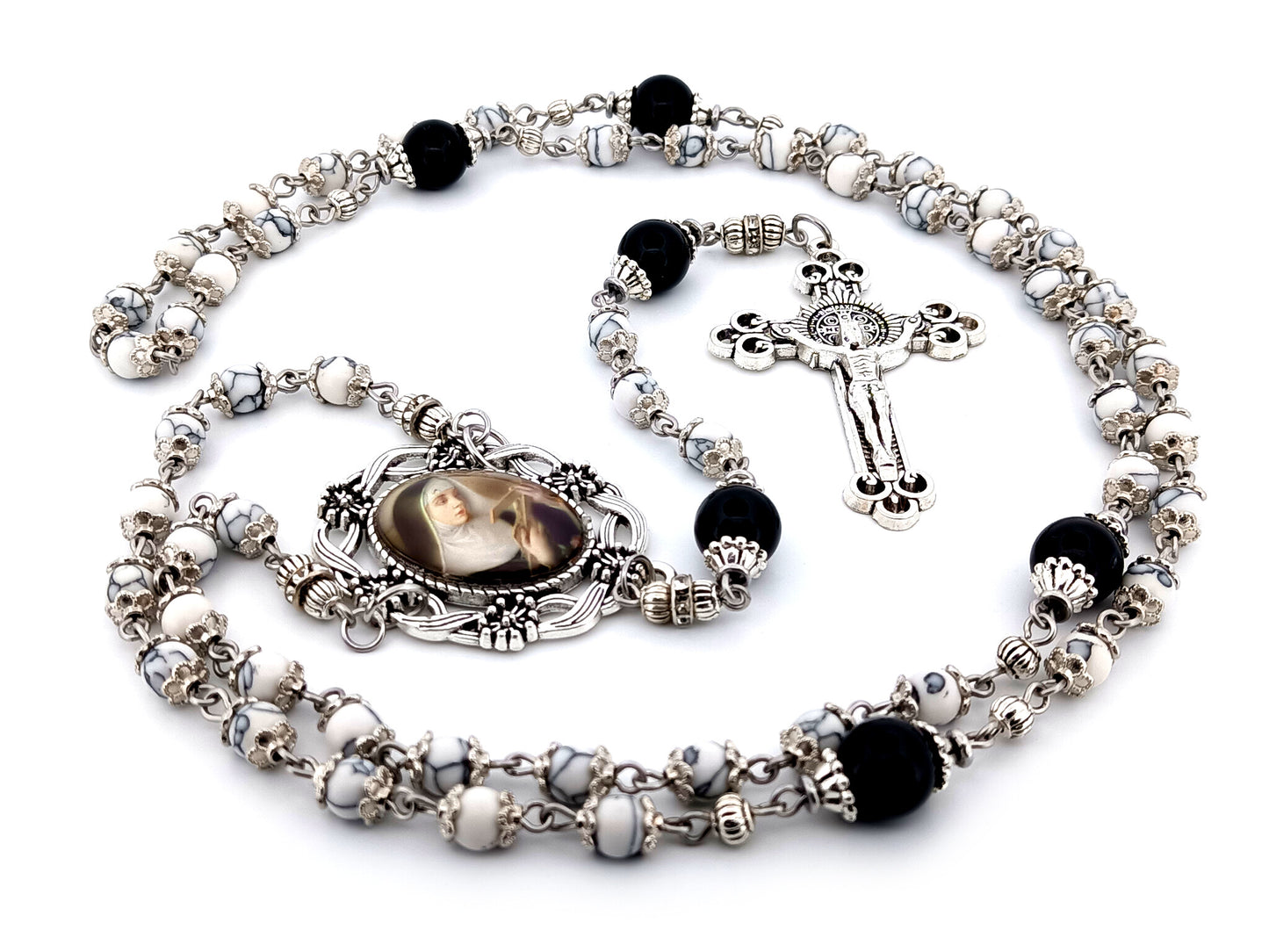 Saint Rita unique rosary beads howlite and onyx gemstone rosary with Saint Benedict crucifix.
