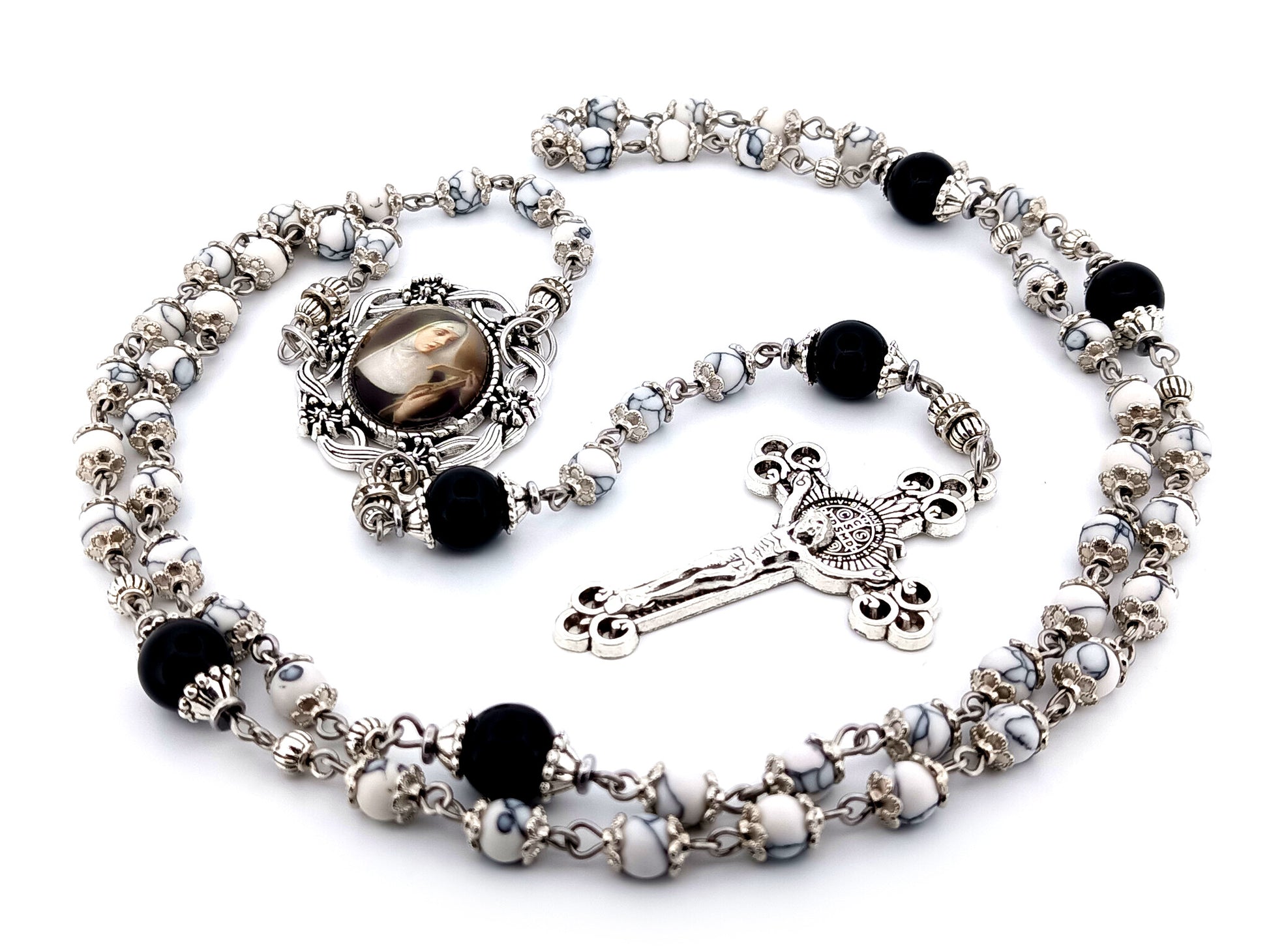 Saint Rita unique rosary beads howlite and onyx gemstone rosary with Saint Benedict crucifix.