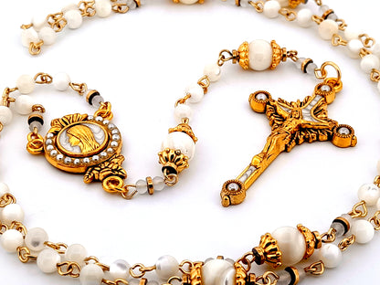 Virgin Mary unique rosary beads mother of pearl rosary with gold plated pearl sunburst crucifix.