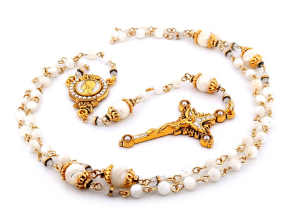 Virgin Mary unique rosary beads mother of pearl rosary with gold plated pearl sunburst crucifix.