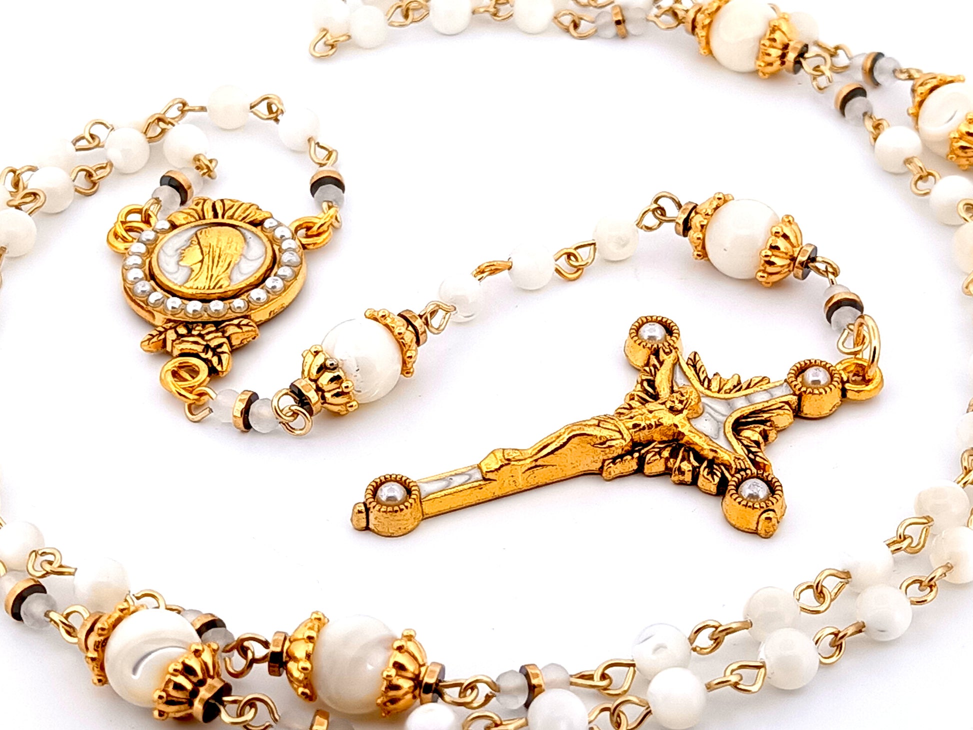 Virgin Mary unique rosary beads mother of pearl rosary with gold plated pearl sunburst crucifix.