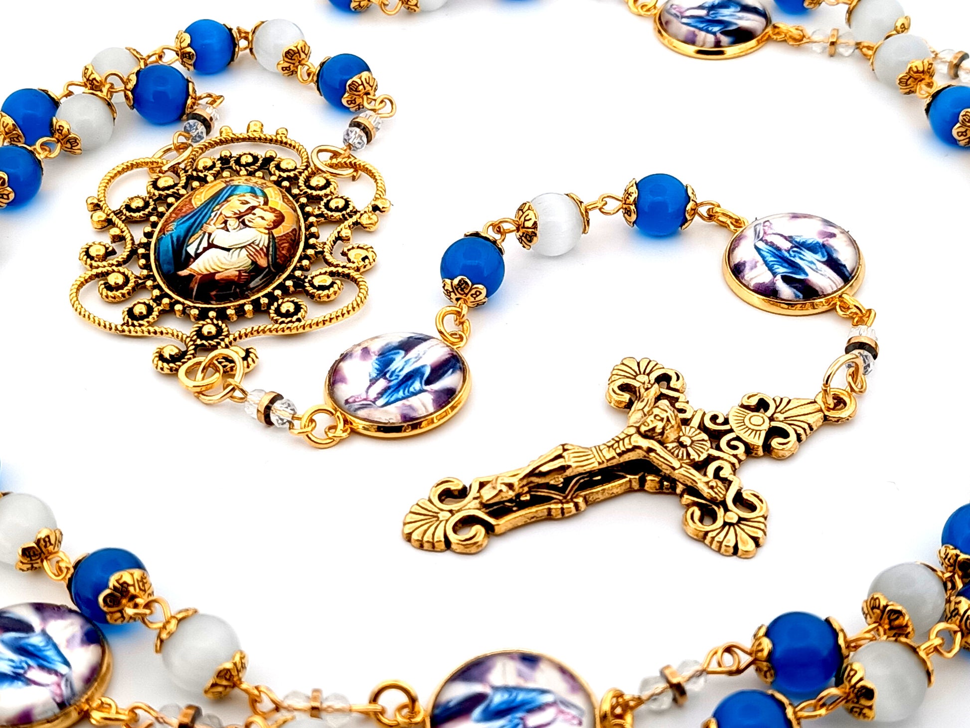 Our Lady of Perpetual Help unique rosary beads blue and opal glass rosary with gold plated filigree crucifix.