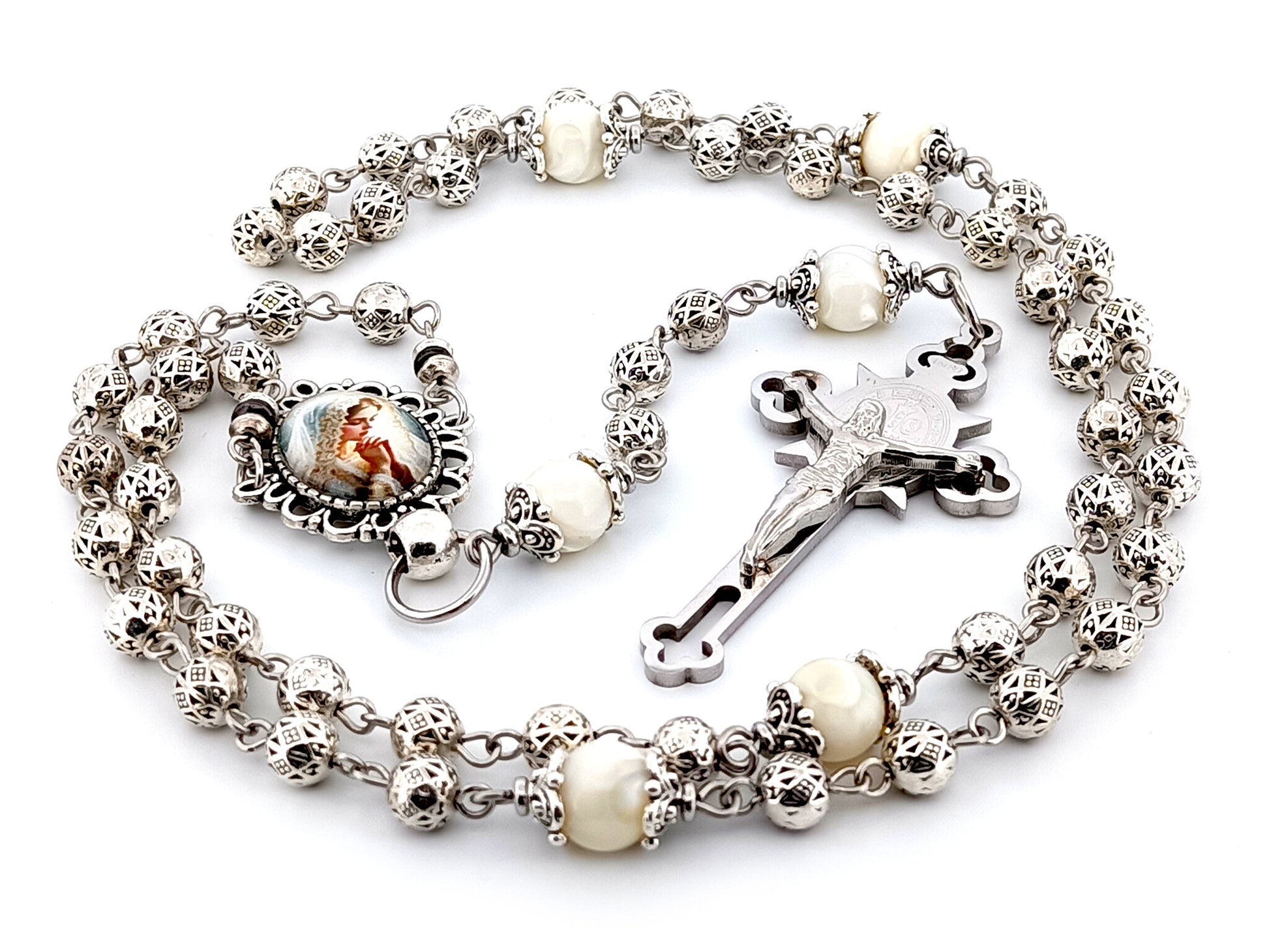 Our Lady Praying silver and mother of pearl unique rosary beads with stainless steel Saint Benedict crucifix.