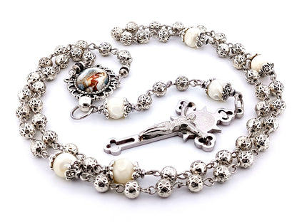 Our Lady Praying silver and mother of pearl unique rosary beads with stainless steel Saint Benedict crucifix.