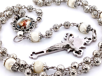 Our Lady Praying silver and mother of pearl unique rosary beads with stainless steel Saint Benedict crucifix.