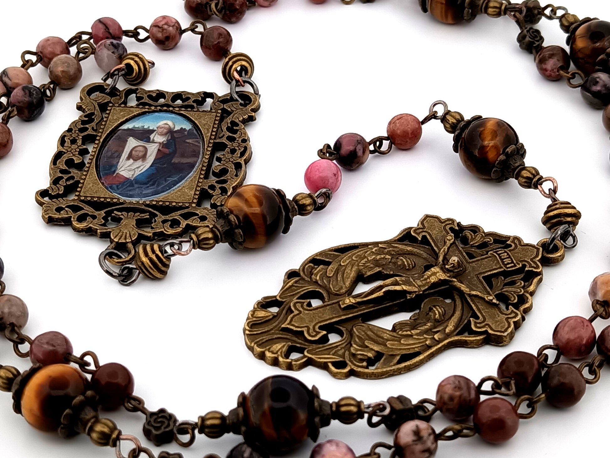 Saint Veronica and the Holy Face rhodochrosite and tigers eye gemstone unique rosary beads with two angels crucifix.