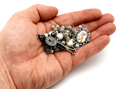 Our Lady Praying silver and mother of pearl unique rosary beads with stainless steel Saint Benedict crucifix.