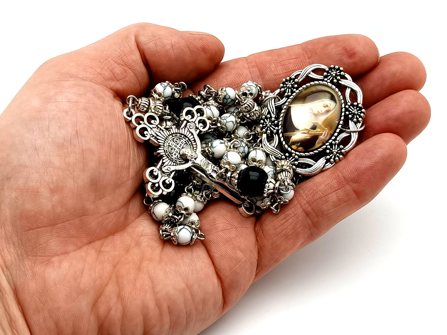 Saint Rita unique rosary beads howlite and onyx gemstone rosary with Saint Benedict crucifix.