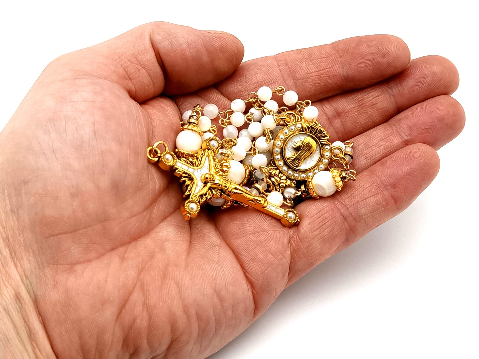 Virgin Mary unique rosary beads mother of pearl rosary with gold plated pearl sunburst crucifix.