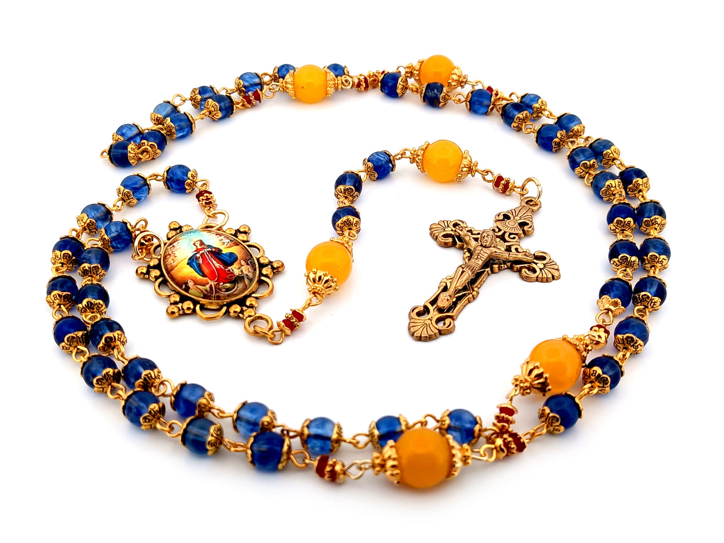 Our Lady Undoer of Knots blue and pale orange glass unique rosary beads with gold plated filigree crucifix.