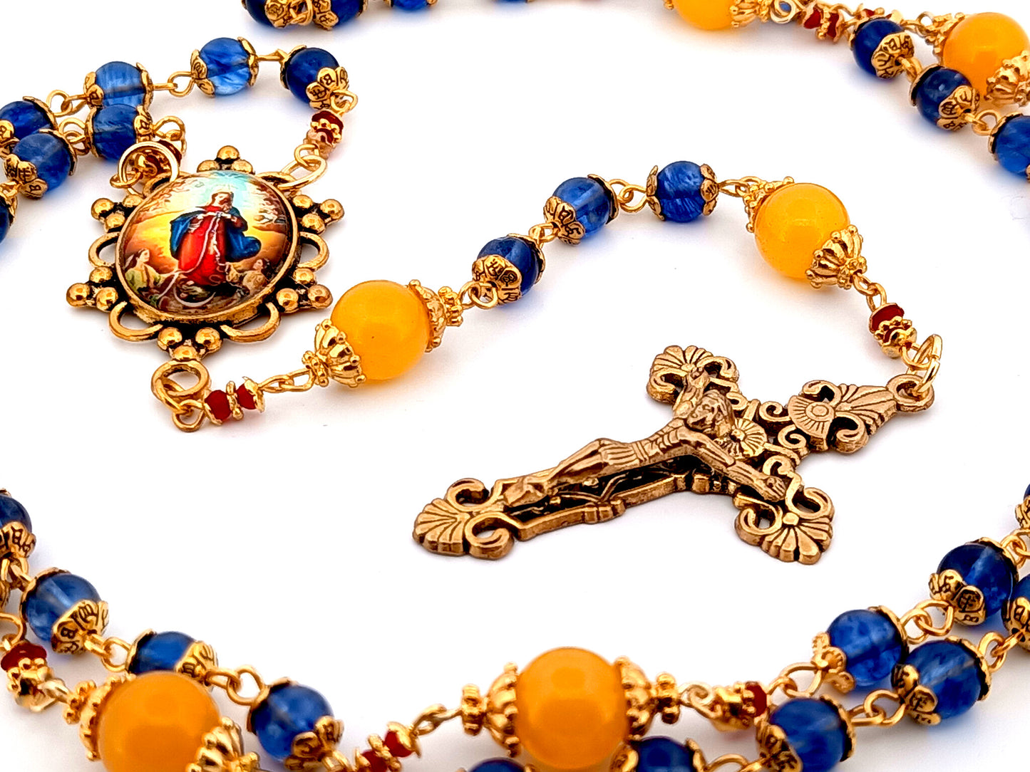 Our Lady Undoer of Knots blue and pale orange glass unique rosary beads with gold plated filigree crucifix.