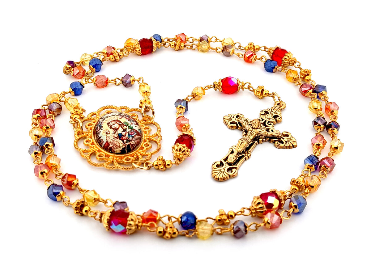 Our Lady of Perpetual Succour multi coloured faceted glass rosary beads with gold plated filigree crucifix.