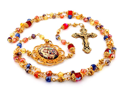 Our Lady of Perpetual Succour multi coloured faceted glass rosary beads with gold plated filigree crucifix.