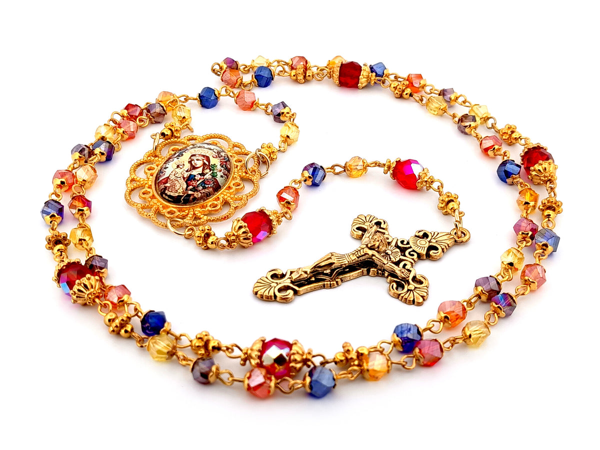Our Lady of Perpetual Succour multi coloured faceted glass rosary beads with gold plated filigree crucifix.