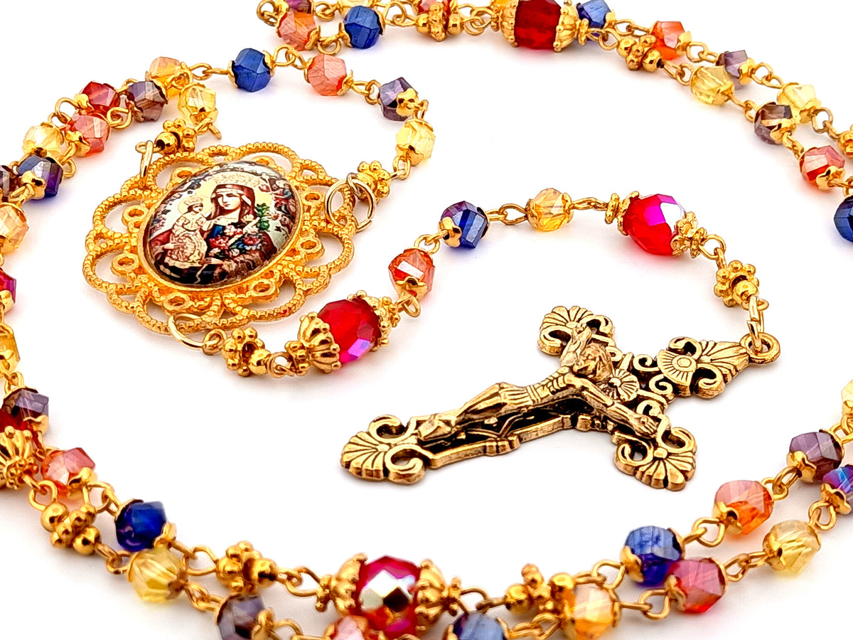 Our Lady of Perpetual Succour multi coloured faceted glass rosary beads with gold plated filigree crucifix.