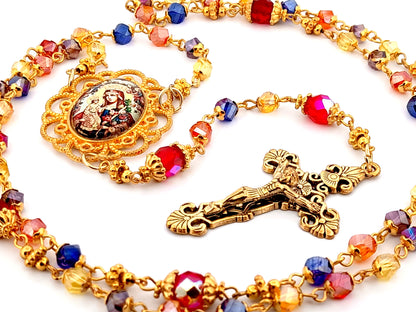 Our Lady of Perpetual Succour multi coloured faceted glass rosary beads with gold plated filigree crucifix.