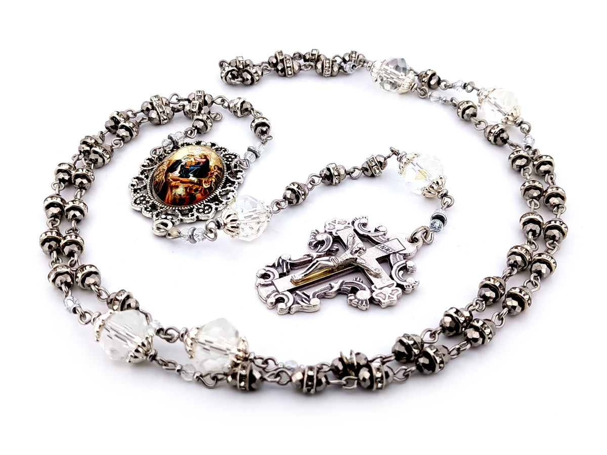 Coronation of Mary faceted glass and cubic zirconia rosary beads with filigree crucifix.