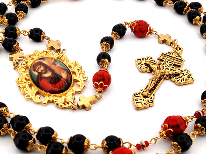 Carrying of the Cross onyx and howlite gemstone unique rosary beads with gold plated Pardon crucifix.