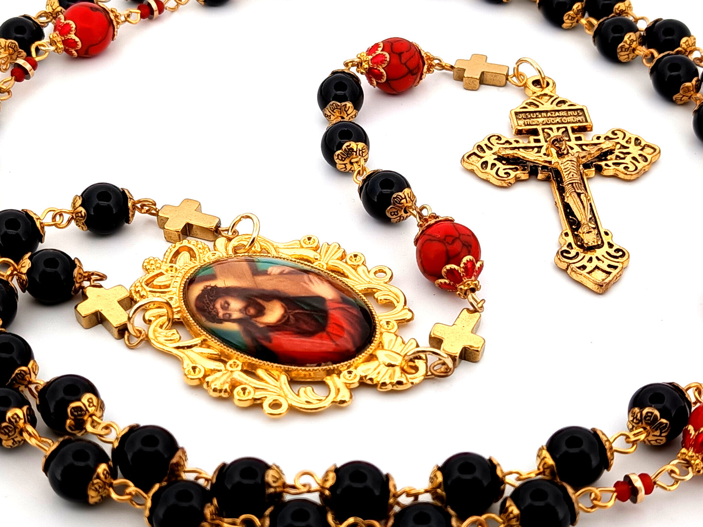 Carrying of the Cross onyx and howlite gemstone unique rosary beads with gold plated Pardon crucifix.