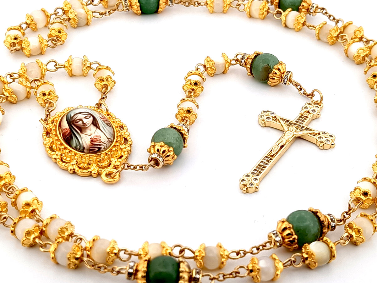 Virgin Mary mother of pearl and peridot gemstone unique rosary beads with 18K gold plated cubic zirconia crucifix.