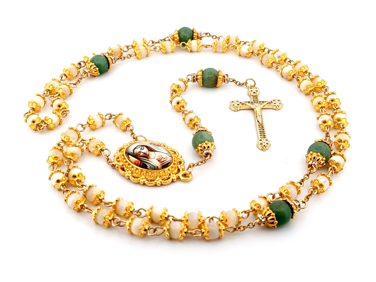 Virgin Mary mother of pearl and peridot gemstone unique rosary beads with 18K gold plated cubic zirconia crucifix.