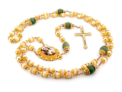 Virgin Mary mother of pearl and peridot gemstone unique rosary beads with 18K gold plated cubic zirconia crucifix.