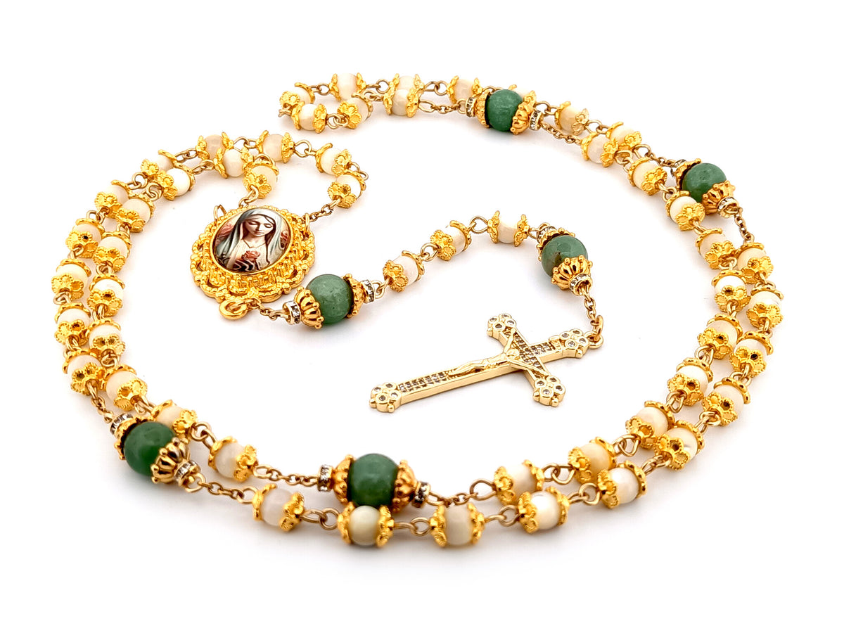 Virgin Mary mother of pearl and peridot gemstone unique rosary beads with 18K gold plated cubic zirconia crucifix.