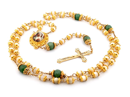 Virgin Mary mother of pearl and peridot gemstone unique rosary beads with 18K gold plated cubic zirconia crucifix.