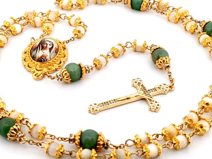 Virgin Mary mother of pearl and peridot gemstone unique rosary beads with 18K gold plated cubic zirconia crucifix.
